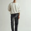 Cycle Jeans SS 25 - Indossato_felpa e denim trattati manualmente con una nuova pasta materica effetto gesso